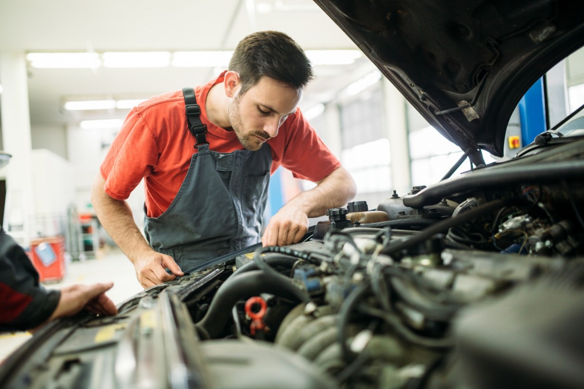 mechanic working on car