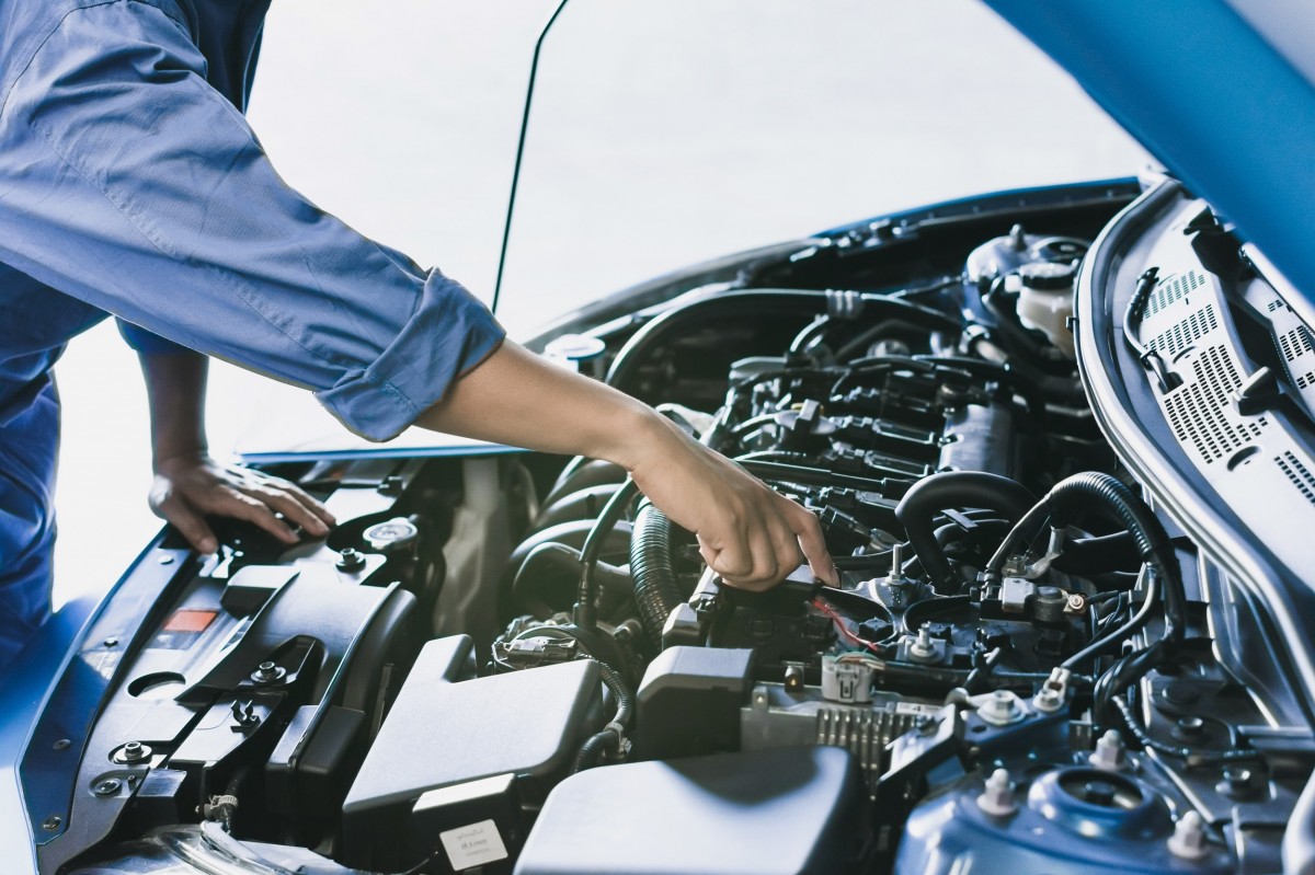 mechanic working on a vehicle